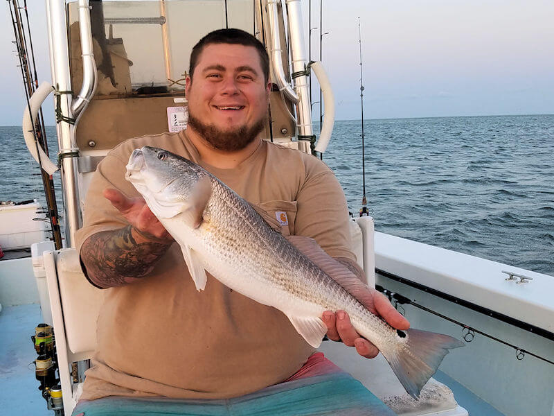Morgan shows off a nice Red Drum caught near Hatteras Inlet.