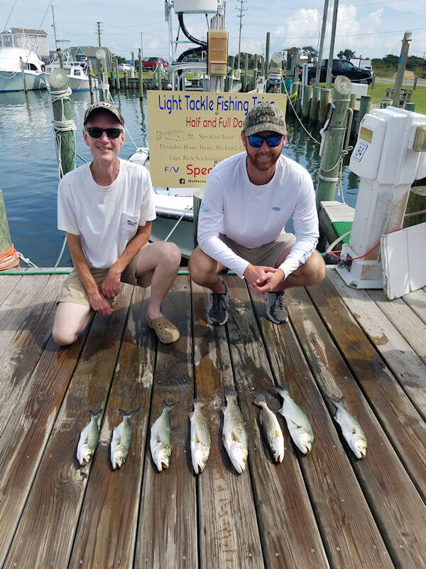 Bennett and Dave Bradley at the Teach's Lair dock with their catch of Bluefish and Specks.